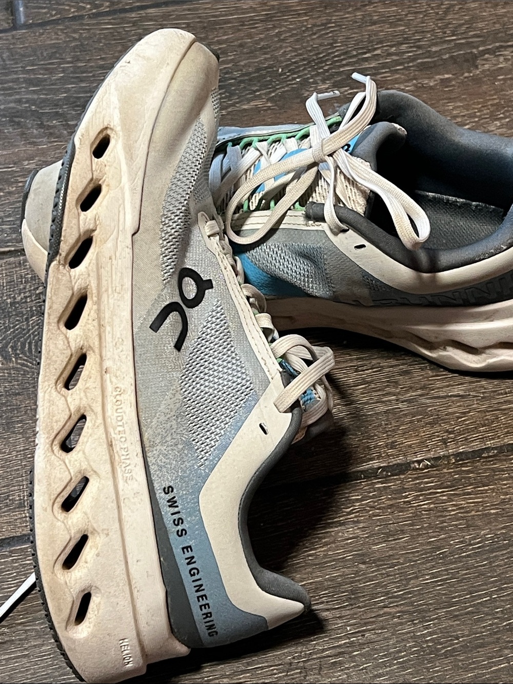 On Running women’s Athletic Shoes in Light Gray and Blue-Green Accents